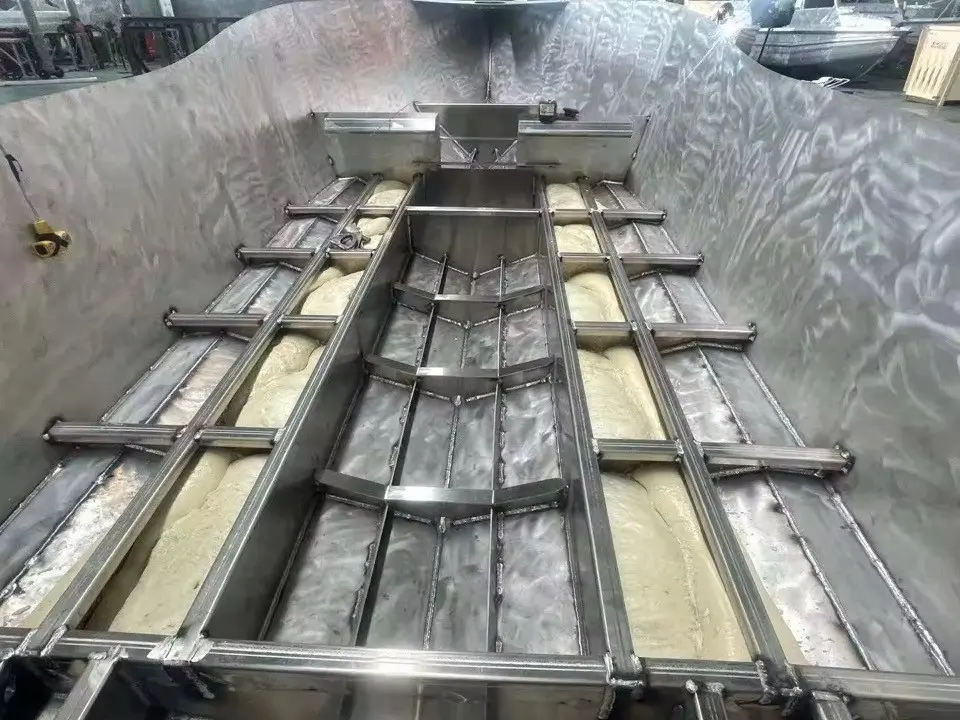 Hull stringers with foam fill packed between them