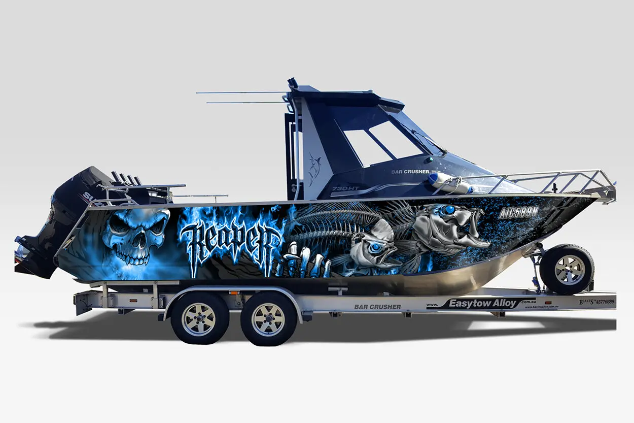 Custom vinyl marine wrap applied to a boat hull
