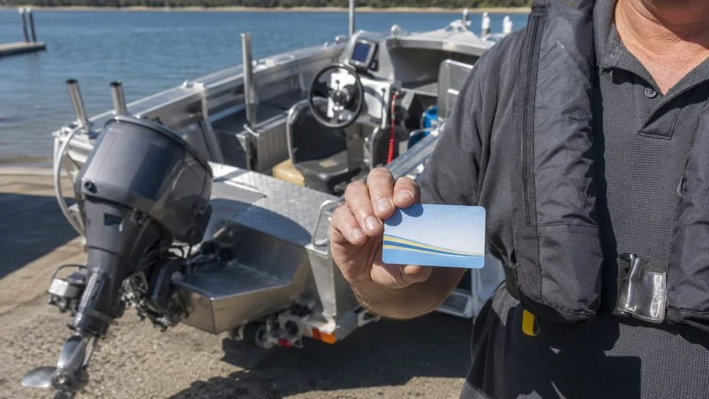 Australian boat licence beside an aluminium fishing boat