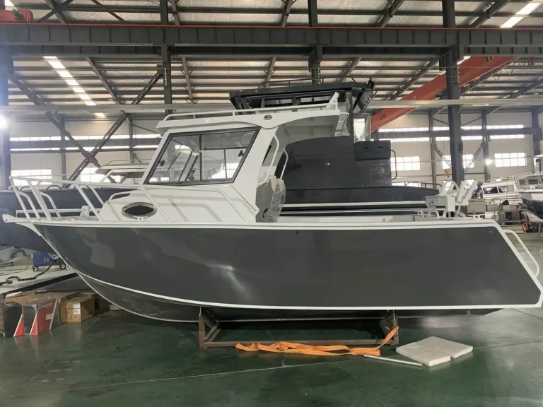 Bare aluminium cabin boat on the factory floor