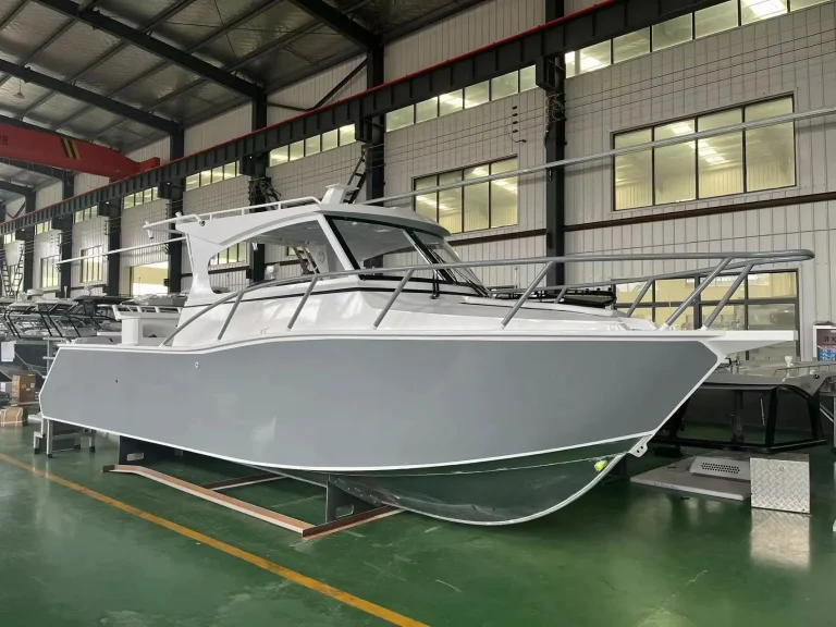 Bare aluminium cabin boat on the factory floor