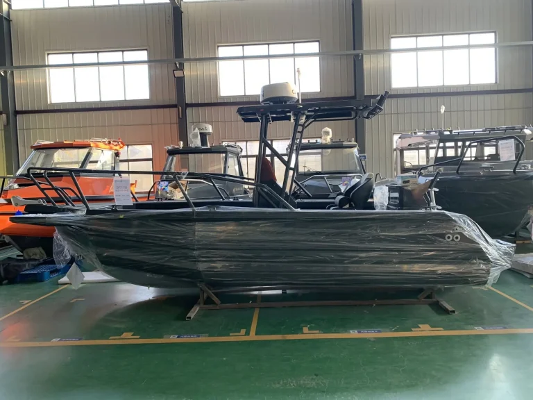 Bare aluminium centre console boat in the factory