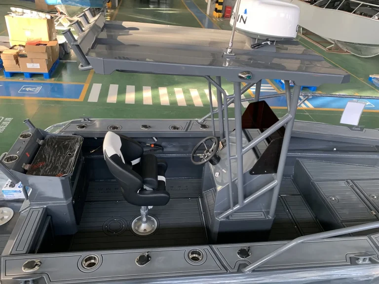 Bare aluminium cockpit with deck hatches