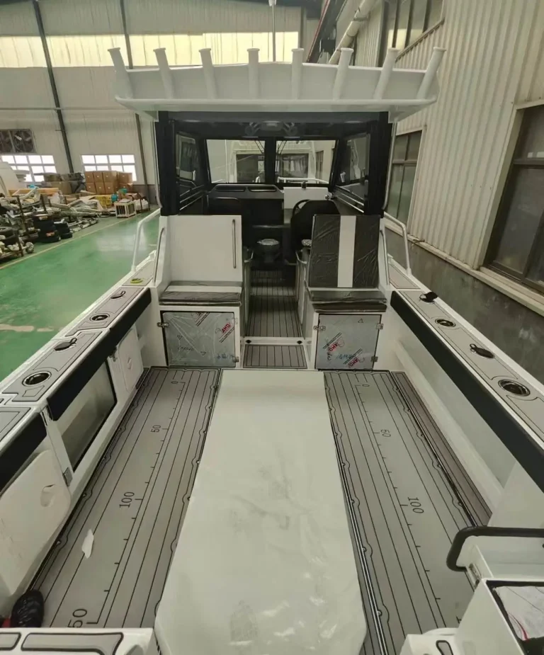 Bare aluminium deck and wheelhouse doorway