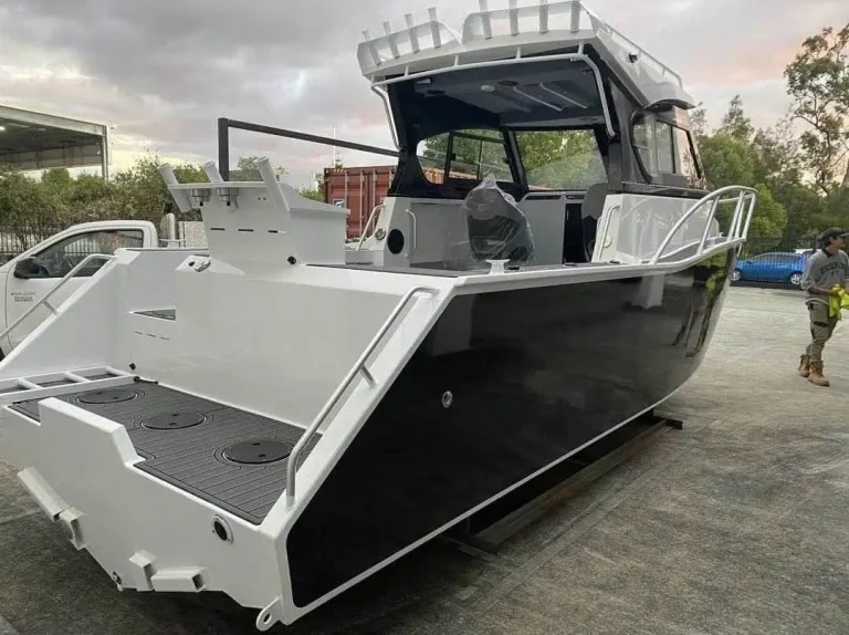 Bare aluminium hull and hardtop before painting