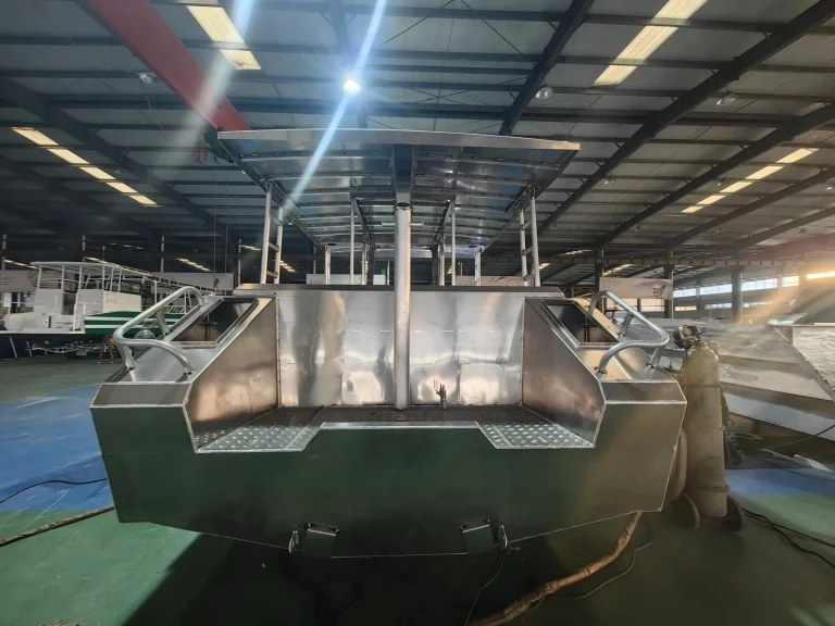 Bare aluminium hull with bow ramp in the factory