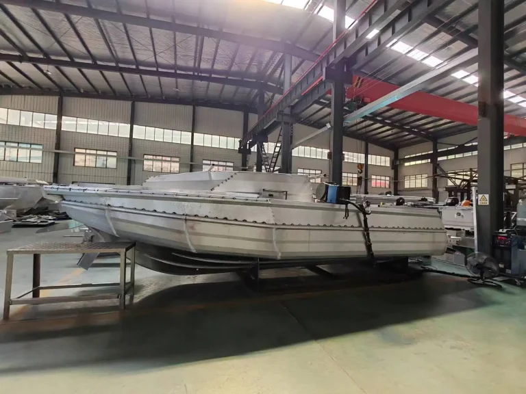 Bare aluminium hull with cabin frame in the factory