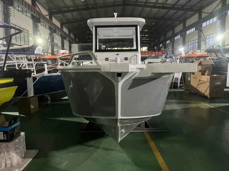 Bare aluminium hull with console in the factory