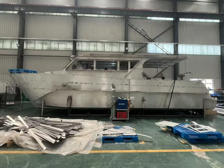 Bare aluminium hull with wheelhouse in build