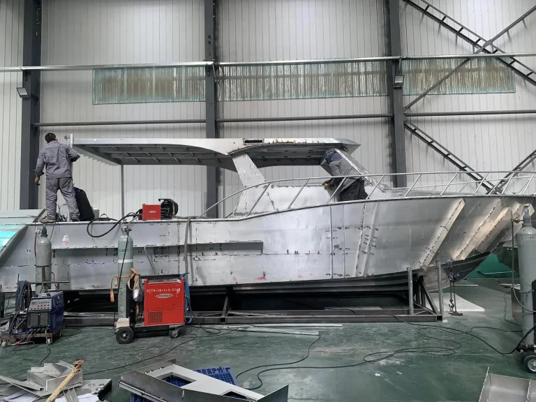 Bare aluminium passenger boat under construction