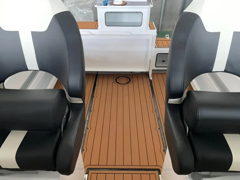 Black bolster seats and teak look deck