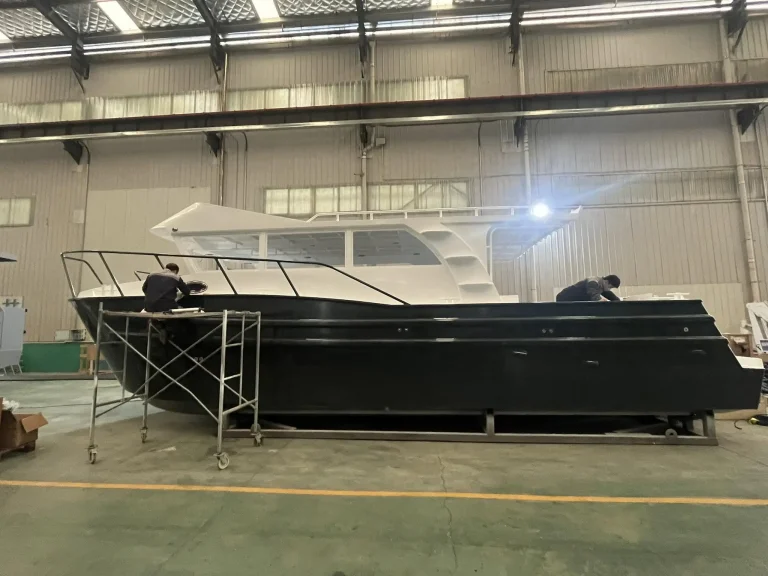 Black plate aluminium work boat under fit out
