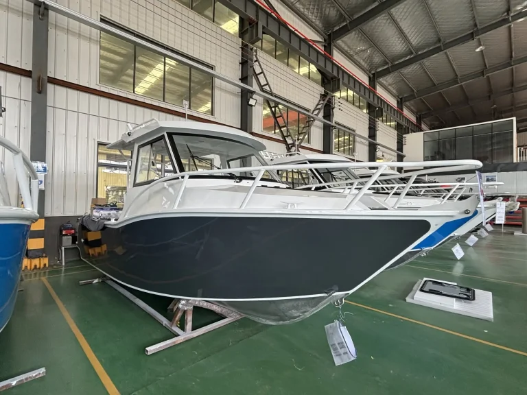 Blue and white plate aluminium boat in build