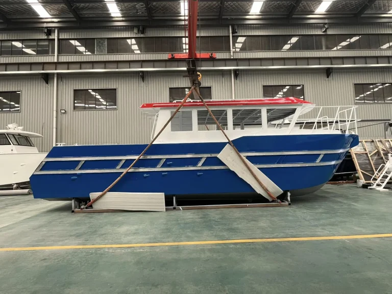 Blue and white plate aluminium work boat in the factory