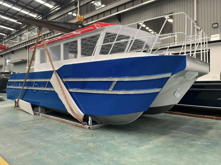 Blue plate aluminium passenger boat under fit out