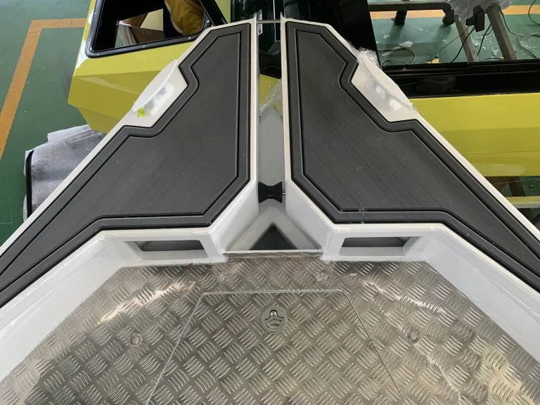 Bow casting deck with black and white teak look flooring