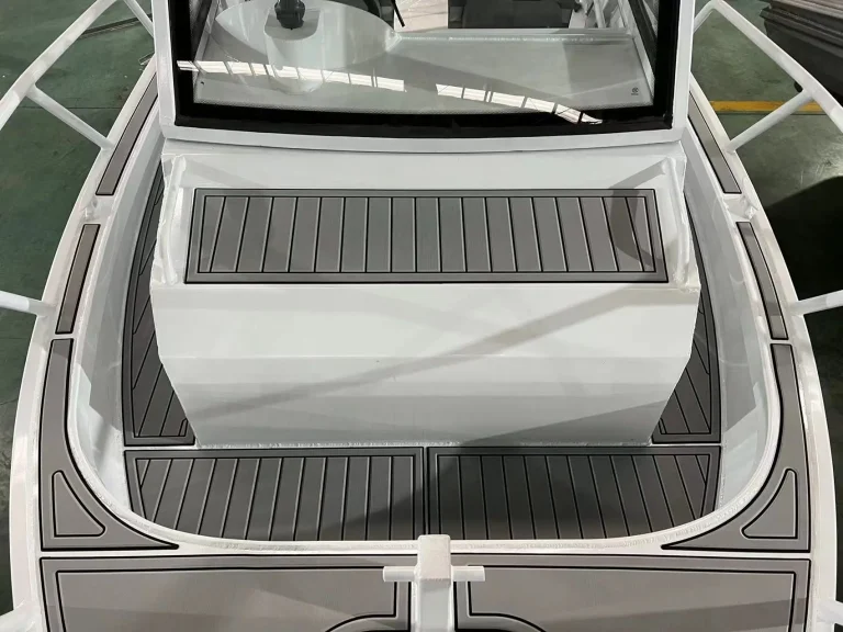 Bow casting deck with teak look flooring and hatch