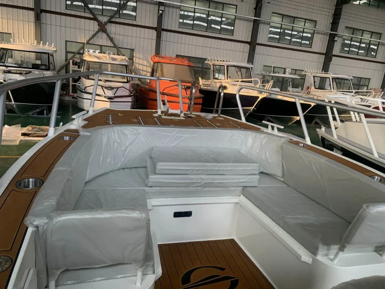 Bow lounge seating under protective wrap