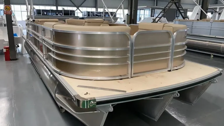 Bow of a champagne coloured aluminium pontoon boat