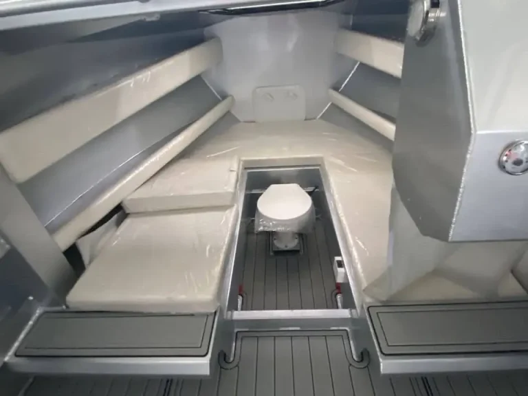 Bow toilet compartment inside a plate aluminium cabin boat