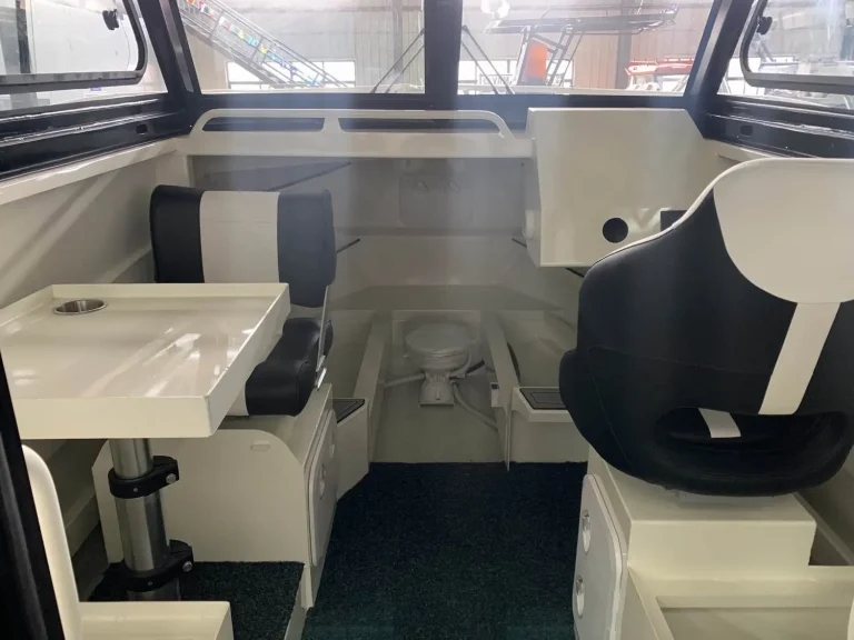Cabin galley and helm seat with cream trim