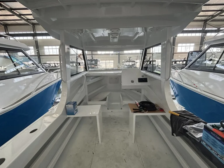 Cabin interior before upholstery with wide windscreen