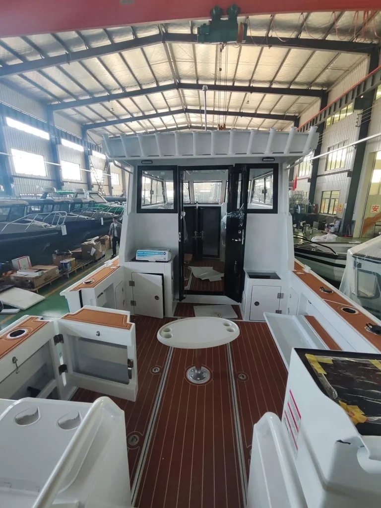 Cabin interior with timber look floor and galley