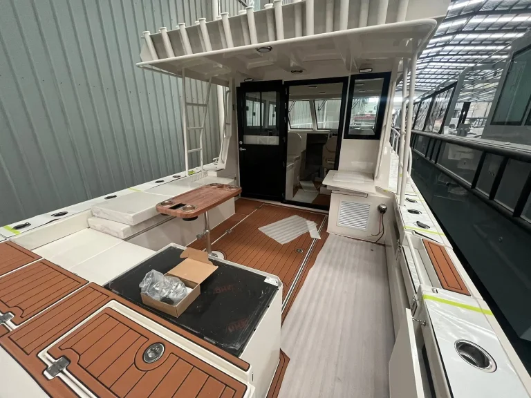 Cabin interior with timber look floor and seating