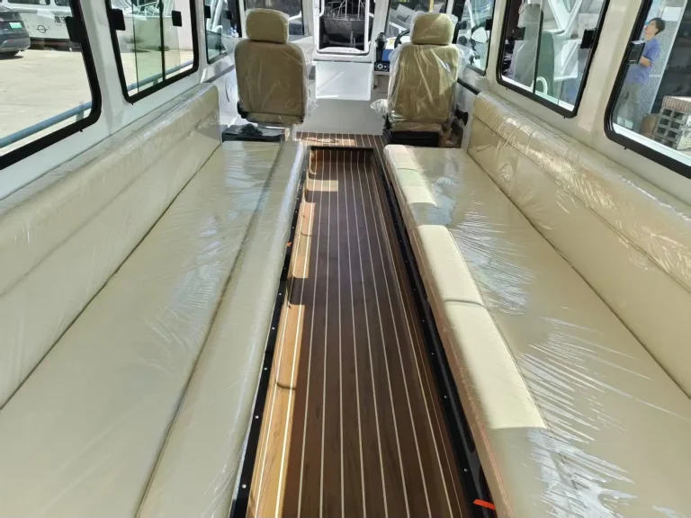 Cabin seating and aisle with teak look flooring