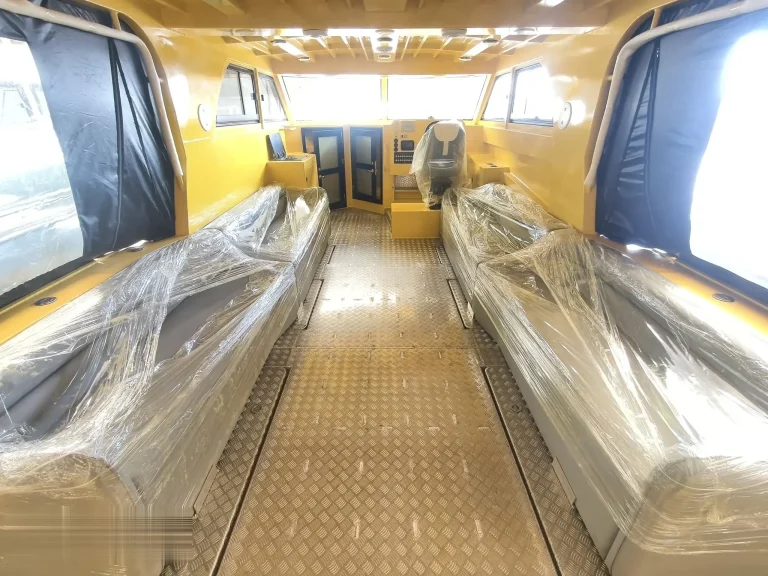 Cabin walkway with checker plate flooring under wrap