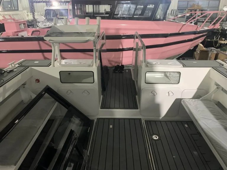 Cockpit and transom looking aft with teak look flooring