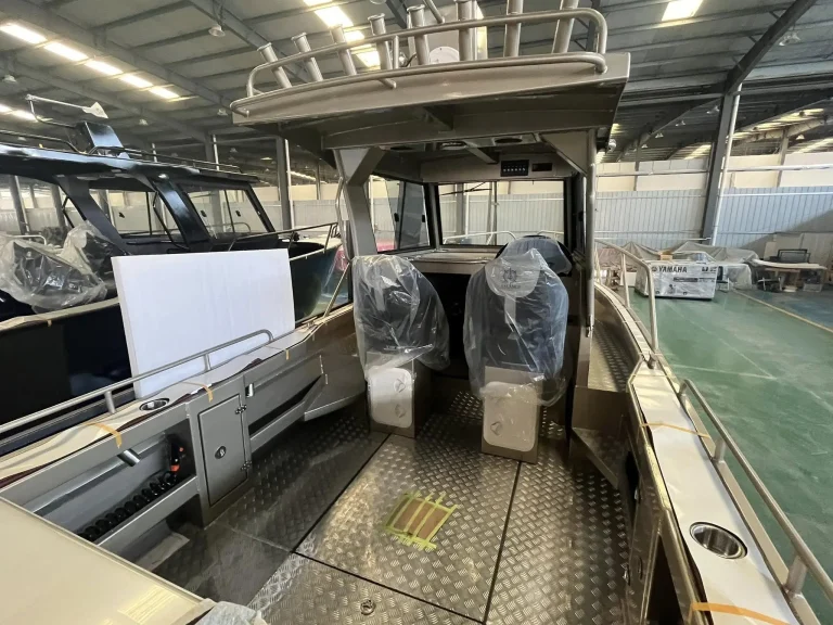Cockpit with checker plate floor and wrapped seats