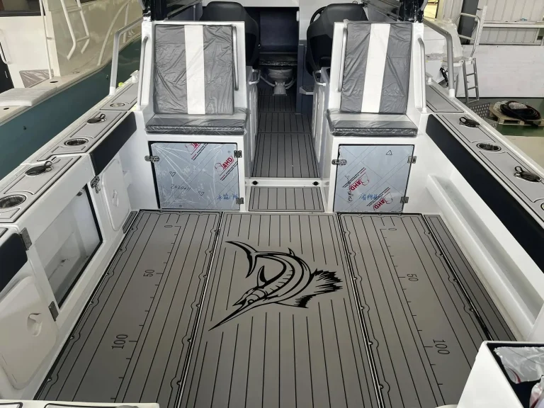 Cockpit with marlin motif on teak look flooring