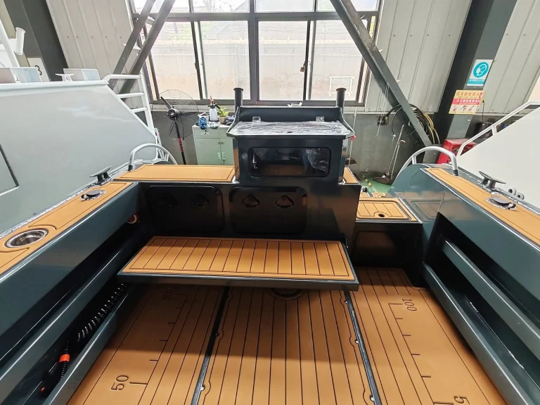 Cockpit with timber decking and rod tracks