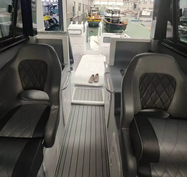 Diamond stitched helm seats over a teak look floor