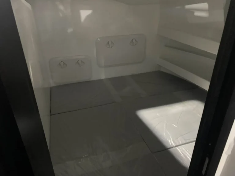 Empty cabin bunk area before upholstery