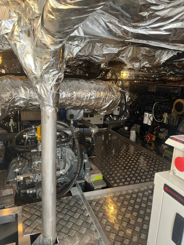 Engine room fit out with wrapped machinery