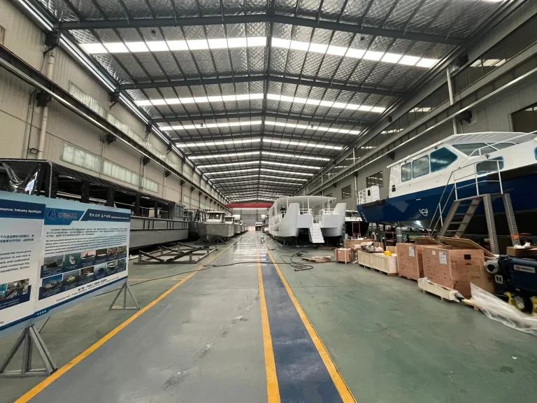 Factory floor with boats under construction