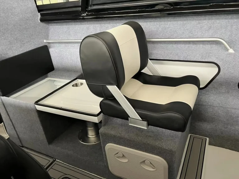 Folding helm seat and side pocket detail