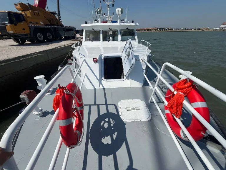 Foredeck of a work boat with life rings