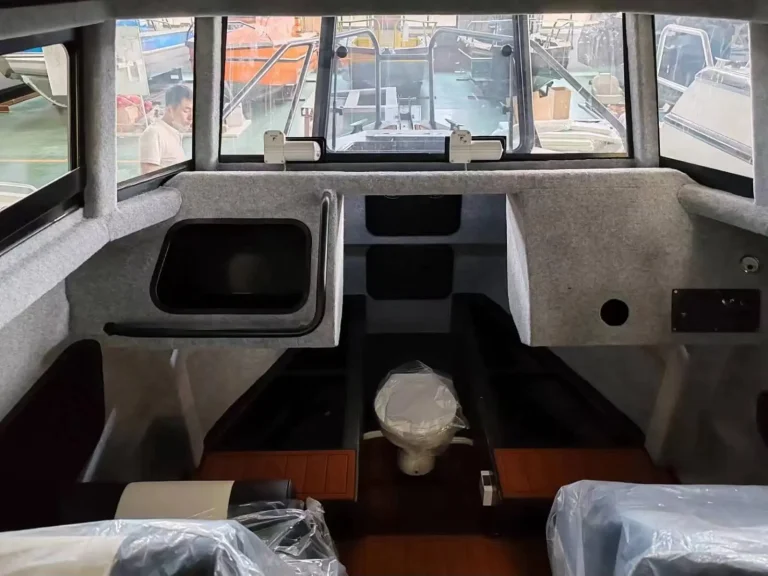 Galley and helm inside a plate aluminium cabin