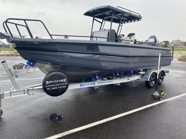 Grey plate aluminium centre console on a trailer in the wet