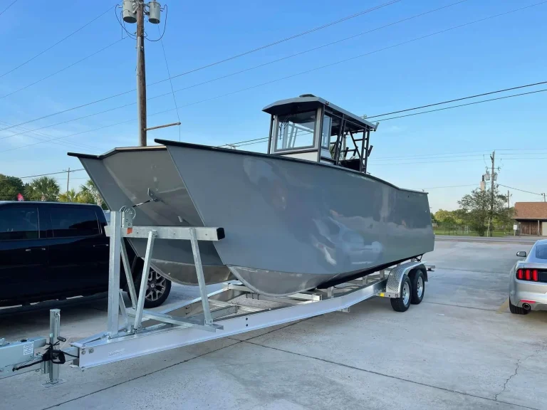 Grey plate aluminium centre console with T-top on a trailer