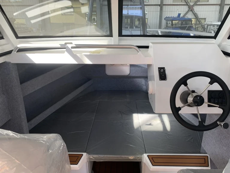 Helm and dash trimmed in grey with sports wheel