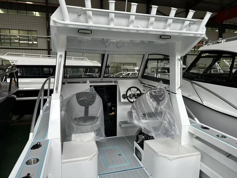 Helm console and seats on a white centre console