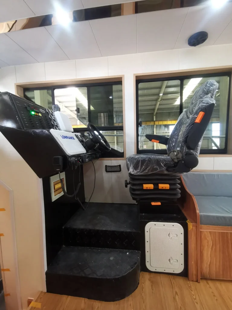 Helm seat and console on a work boat
