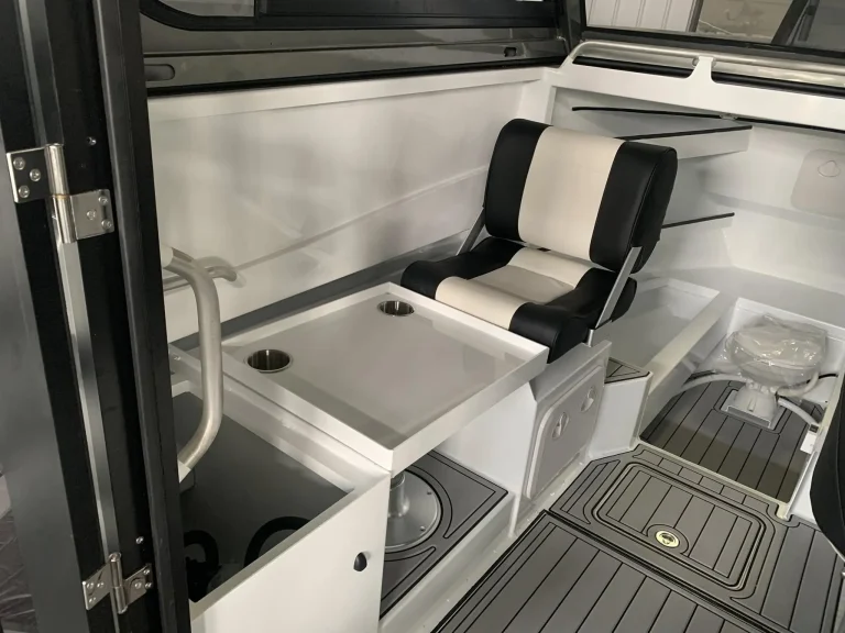 Helm seats and cockpit with teak look flooring