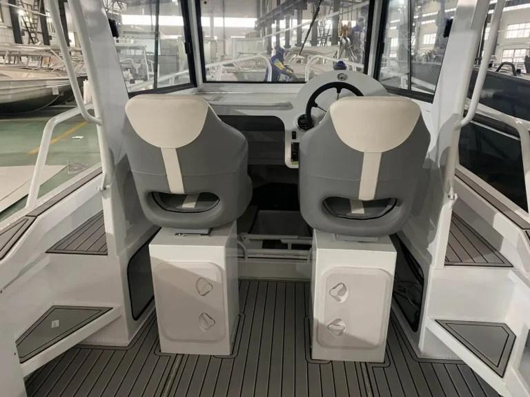 Helm seats and console viewed from the bow