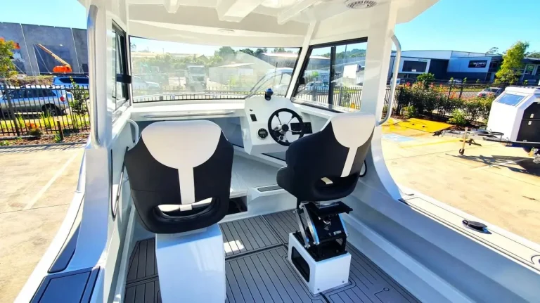 Helm seats and dash looking out through the windscreen