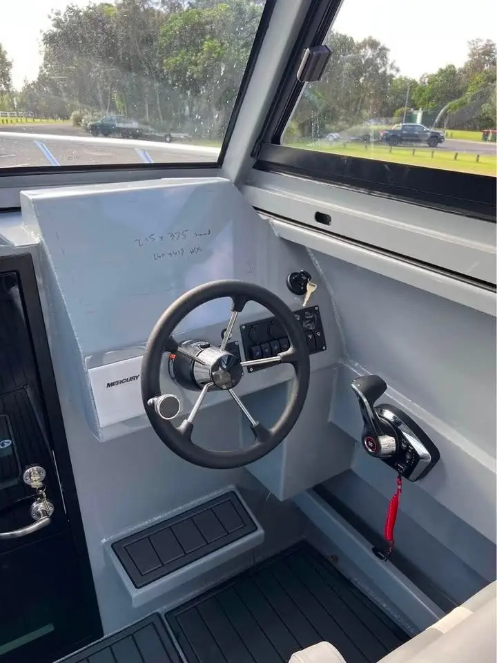 Helm station with wheel and grey trim